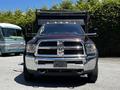 A 2015 RAM 5500 truck with a black and chrome front grille and a large bumper facing directly forward