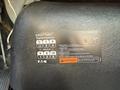 The image shows the gear shift panel of a 2009 International 7500 featuring a 10-speed Eaton Fuller transmission with various range selectors and warning labels