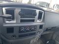 Dashboard of a 2008 Dodge Ram 5500 featuring a radio and climate control knobs