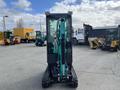 2024 AGT Industrial Green QH13R Mini Excavator facing forward with tracks visible and hydraulic arm raised