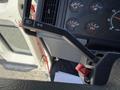 Interior view of a 1994 Volvo FE 42 showing the gear shift lever and dashboard with various gauges and indicators