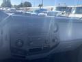 Interior dashboard of a 2014 Ford F-250 SD featuring audio controls and climate settings