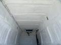 Interior view of a 2019 Mercedes-Benz Sprinter van showing a white insulated ceiling and a mounted air conditioning unit