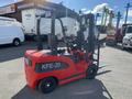 Red 2024 AGT KFE20 forklift with a transparent cab and large front forks designed for lifting and transporting heavy materials