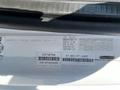 A 2012 Freightliner M2 112 vehicle identification label displaying serial number manufacturer details and production date