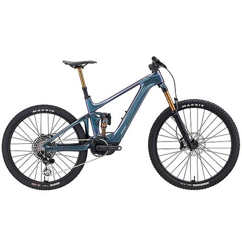 2024 Giant Trance X Advanced E Elite 0 Mountain Bike showcasing a sleek blue frame with extended suspension a prominent electric motor and high-performance tires