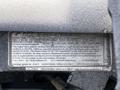 Label from a 2015 Mitsubishi Fuso FE engine indicating specifications emissions controls and regulatory information