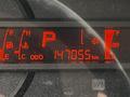 A vehicle dashboard display showing an odometer reading of 147055 kilometers for a 2018 Hino 195