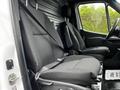 Two black fabric seats with seatbelts inside a 2019 Mercedes-Benz Sprinter van