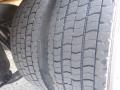 Close-up of a tire from a 2014 International Durastar showing detailed tread pattern and surface texture