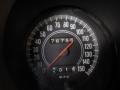 Speedometer of a 1974 Dodge Challenger displaying a mileage of 76756 with a needle pointing slightly above 0 M P H