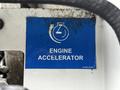 A blue engine accelerator sign with a circular arrow and a flask icon indicating function