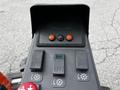 Control panel of a 2015 Jacobsen Eclipse featuring buttons and switches for operation and settings