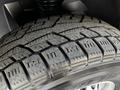 Close-up of a tire from a 2020 Mercedes-Benz Sprinter showing tread pattern and detail