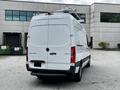 2020 Mercedes-Benz Sprinter van in white with a black lower section and roof-mounted equipment