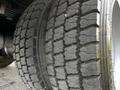 Close-up of a 2016 Ford F-550 tire showing deep treads and a robust design suitable for heavy-duty use