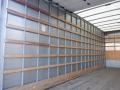 Interior of a 2014 International Durastar box truck featuring wooden slats along the walls and a clean wood floor