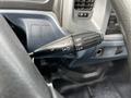 Close-up of the windshield wiper control lever in a 2006 Hino 268 showing settings for off intermittent low and high