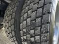 A close-up view of a worn tire from a 2008 Ford F-550 showcasing its tread pattern and surface texture