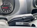 Close-up of the gear shift lever of a 2025 Mercedes-Benz Sprinter showing the P R N D positions