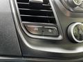 Close-up of the control panel in a 2022 Ford Transit featuring buttons for mode selection and air conditioning adjustments