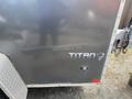 A gray 2020 Stealth Enterprises trailer with a diamond plate finish featuring the word "TITAN" in metallic letters on its side