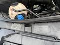 2016 Mercedes-Benz Sprinter engine compartment showing various components including a coolant reservoir and engine labels
