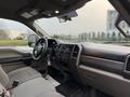 Interior view of a 2017 Ford F-350 SD showing the dashboard steering wheel and seats with controls and display features visible