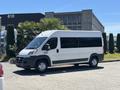 A 2016 RAM Promaster van with a white exterior and black accents parked on a paved surface