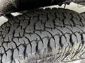 Close-up of a textured tire tread on a 2019 Mercedes-Benz Sprinter showcasing deep grooves and patterns designed for traction