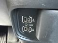 A close-up of a 2020 Ram 2500's interior control panel showing two USB ports labeled 1 and 2 along with an AUX input