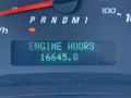 The dashboard display of a 2013 Chevrolet Express showing the text ENGINE HOURS and the number 16645.8