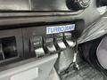 Control panel with labeled switches for AUX 1 AUX 2 AUX 3 AUX 4 and a TURBO BAR switch in a 2015 Ford F-350 SD
