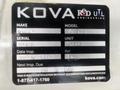 A metal label displaying details about a 2009 Ford Econoline including make model serial number and inspection date