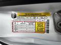 A 2014 Ford Transit Connect tire information label showing details on tire dimensions and loading information