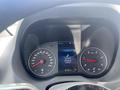 Dashboard of a 2025 Mercedes-Benz Sprinter showing speedometer and fuel gauge with a digital display indicating service information and distance traveled
