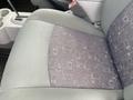 Close-up of a gray upholstered car seat with a patterned fabric design typical of a 2007 Chrysler PT Cruiser