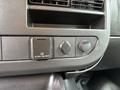 Control panel of a 2018 GMC Savana featuring power outlet and ventilation controls