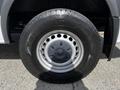 A close-up view of a wheel from a 2017 Mercedes-Benz Sprinter featuring a silver rim and a black tire with visible tread pattern