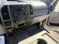 Interior view of a 2017 Ford F-350 SD showing the dashboard controls including audio system and climate controls