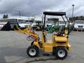 2024 AGT Industrial KRW23 Mini Loader in yellow with a front loader attachment and four wheels designed for compact construction tasks