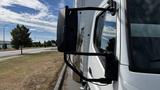 A 2018 Mitsubishi Fuso FE with a side mirror mounted on the cabin showcasing its sleek design and structure