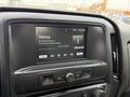 A dashboard display of a 2018 Chevrolet Silverado 1500 showing the song "Helena" by My Chemical Romance with playback controls and Bluetooth indication