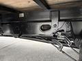 Detail of the undercarriage of a 2020 Ford F-550 showcasing the chassis components and mounting brackets designed for durability and support