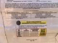 A label detailing tire and loading information for a 2022 Keystone Hide Out RDWE 20RDWE including weight capacity and tire pressure specifications
