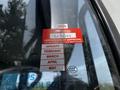 A 2012 Autocar Xpert with a red British Columbia certificate of approval sticker displaying the year 2026 and monthly expiration details
