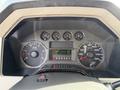 Dashboard of a 2008 Ford F-450 displaying speedometer tachometer and various gauges