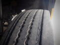 Close-up of a worn tire on a 2008 Freightliner MT45 Chassis showing tread depth and pattern details