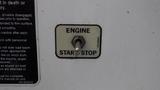 Close-up of a control panel featuring an engine start stop switch for a 2005 International 7400 truck