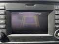 A 2017 Mercedes-Benz Sprinter dashboard display showing a rearview camera with guidelines and a warning to check entire surroundings